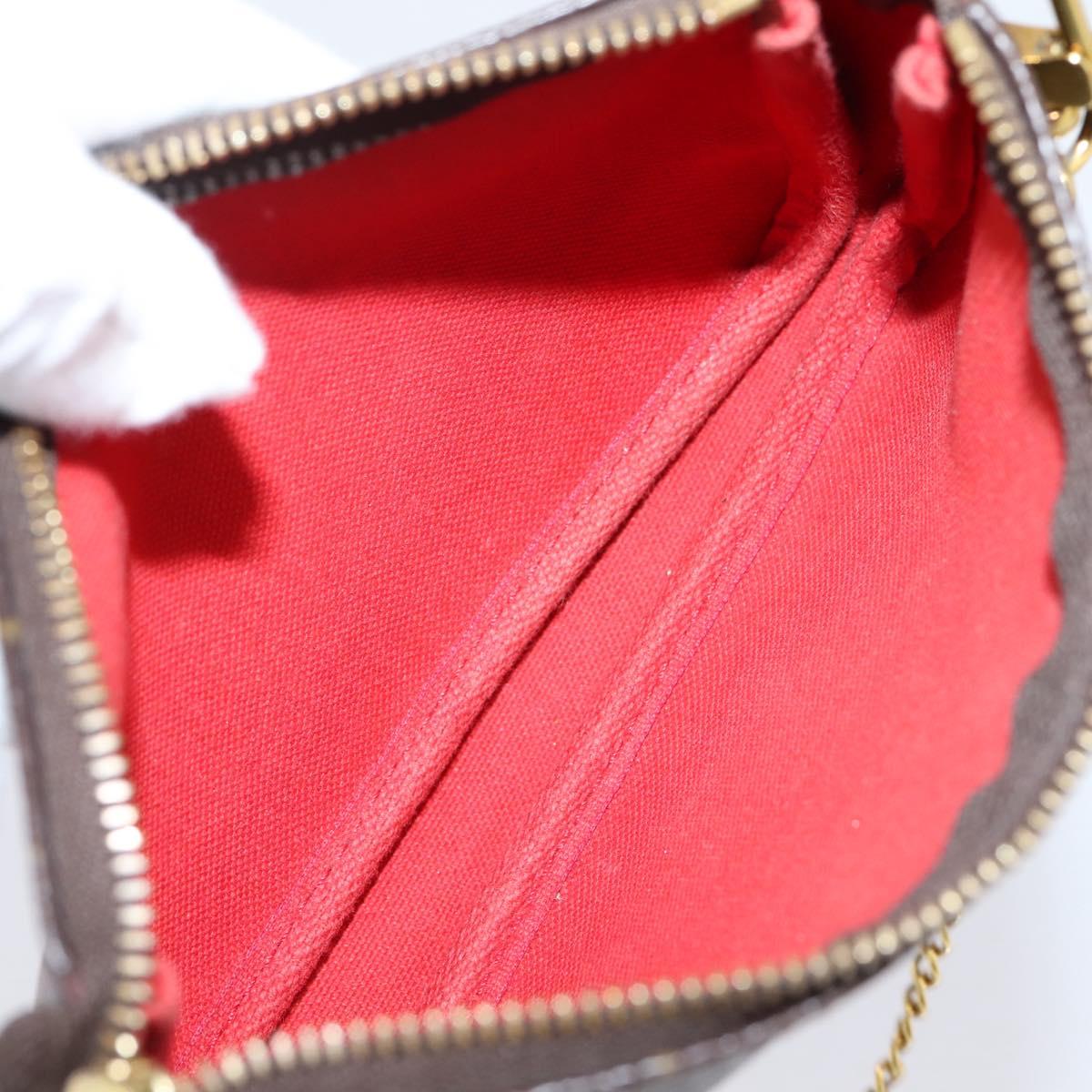Louis Vuitton Monogram Vivienne Mini Pochette Accessoires M69976
